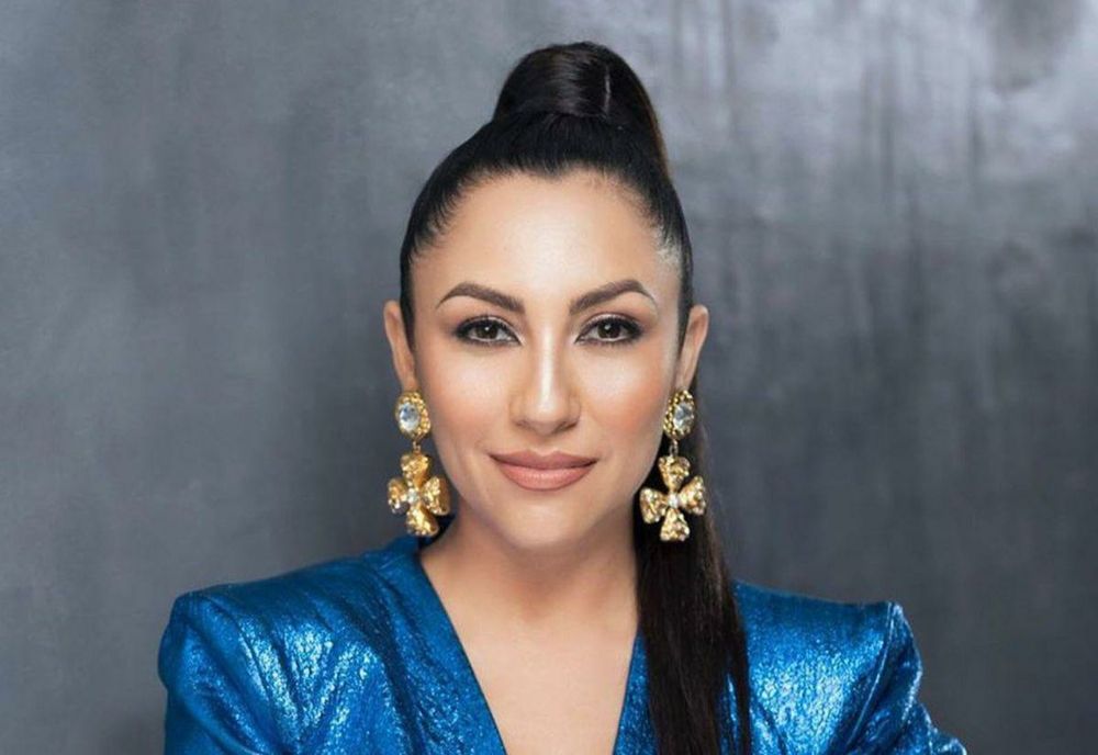 Andra, show la 10.000 de metri înălțime. Artista a cântat colinde în avion VIDEO